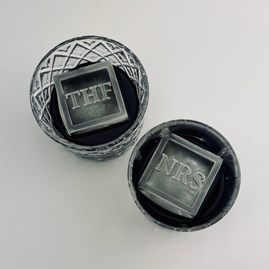 Two black containers with ice cubes labeled 'THF' and 'NRS' on a white background.