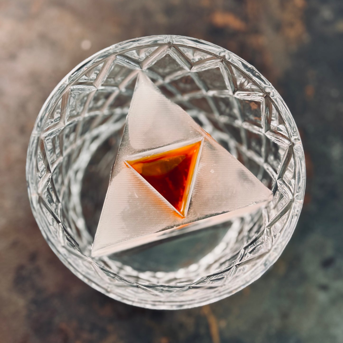 Crystal glass with a triforce ice served at the Hyrule Pub