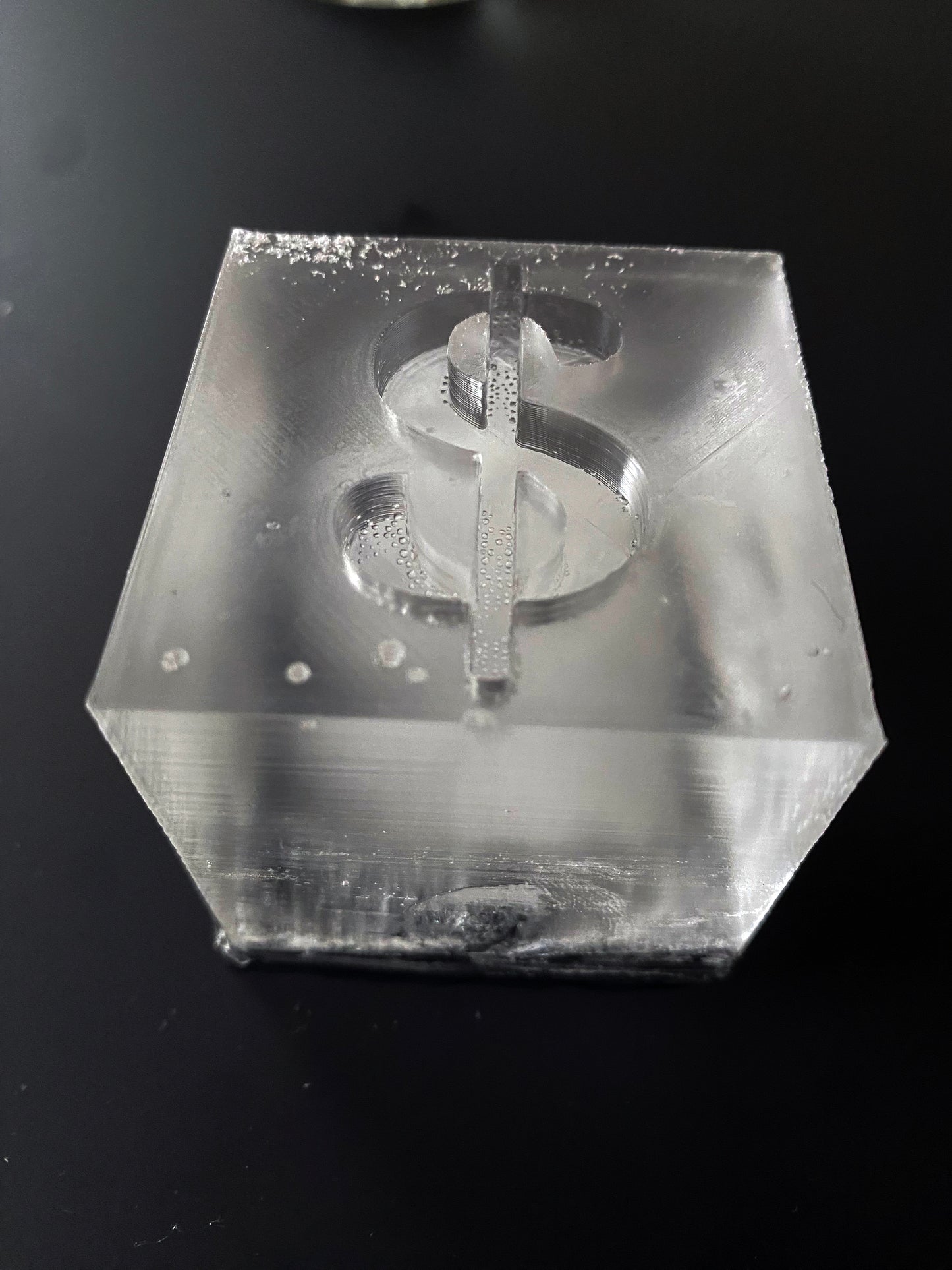 Molde de hielo con forma de dólar $