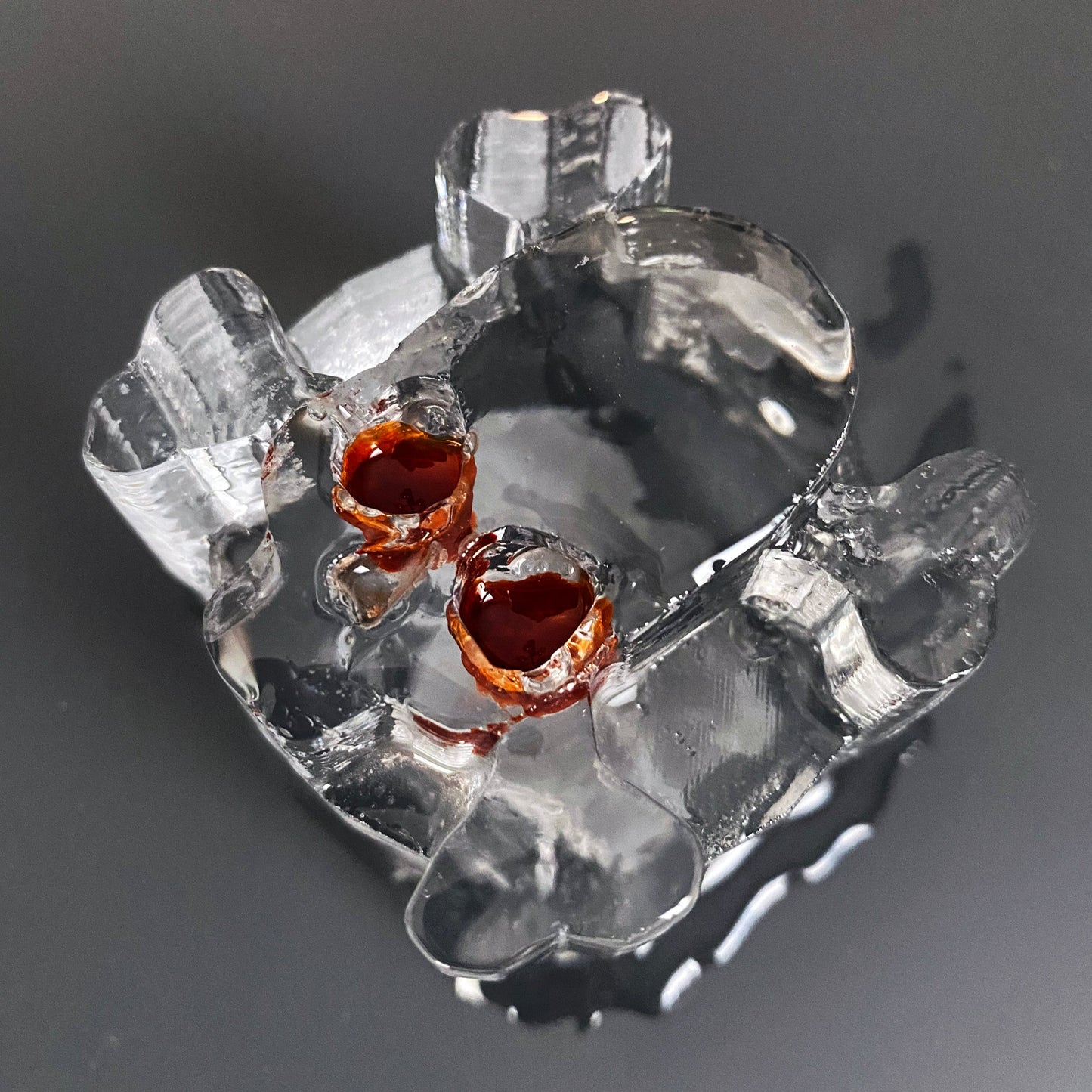 Skull and Crossbones Ice Cube with Grenadine Eyes