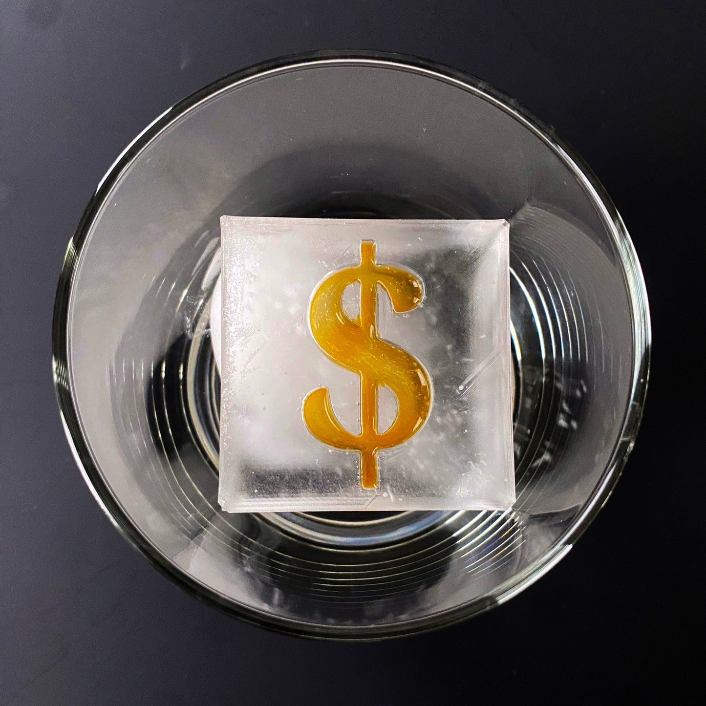 Molde de hielo con forma de dólar $