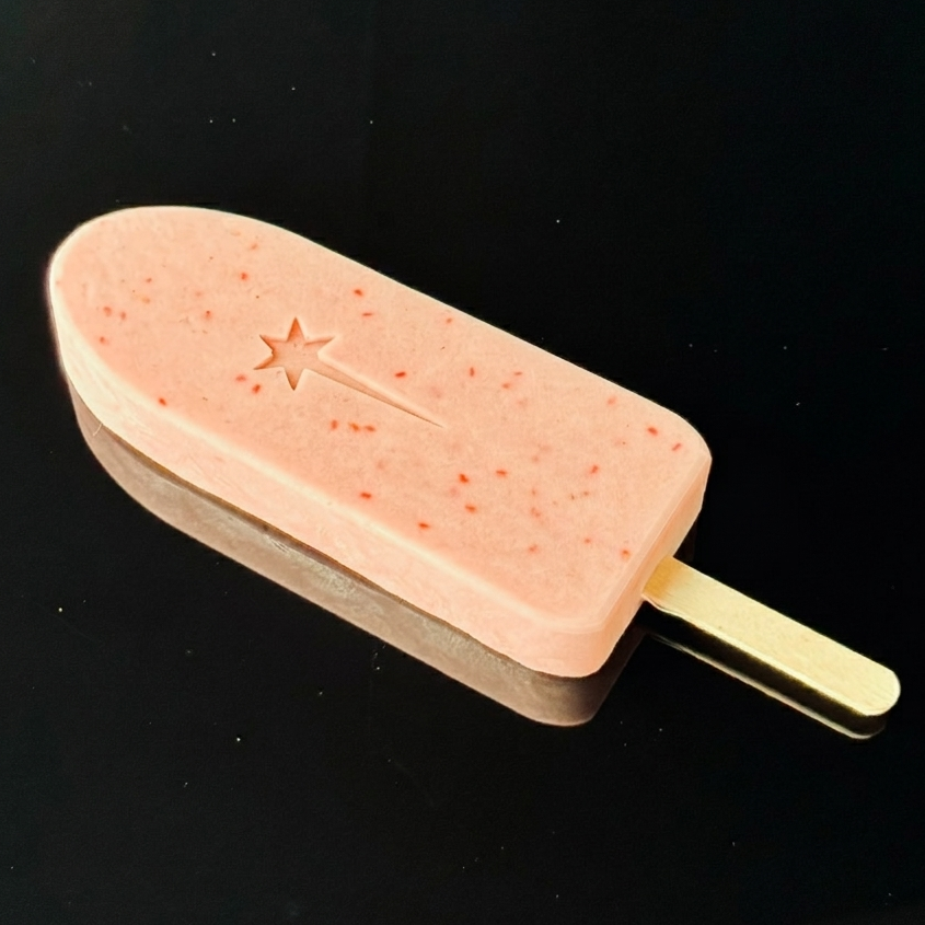 Pink ice cream popsicle on a black background